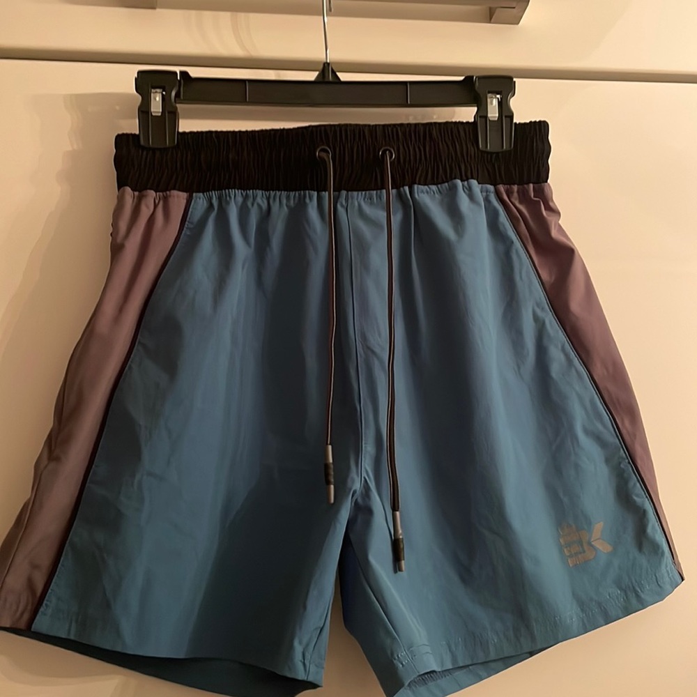 Brokig athletic shorts. Polyester size large. Drawstring